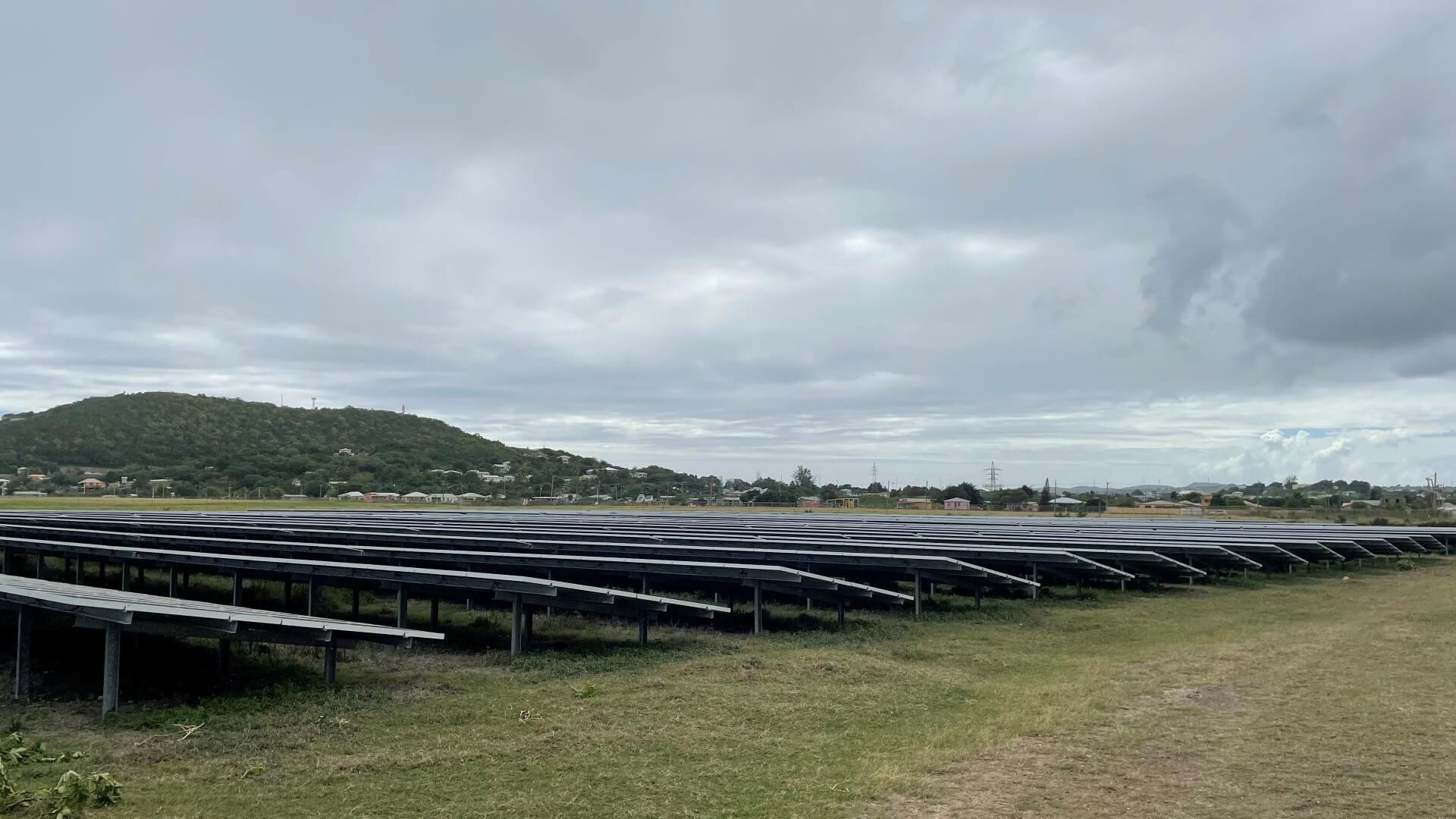 view looking along rows of solar panels