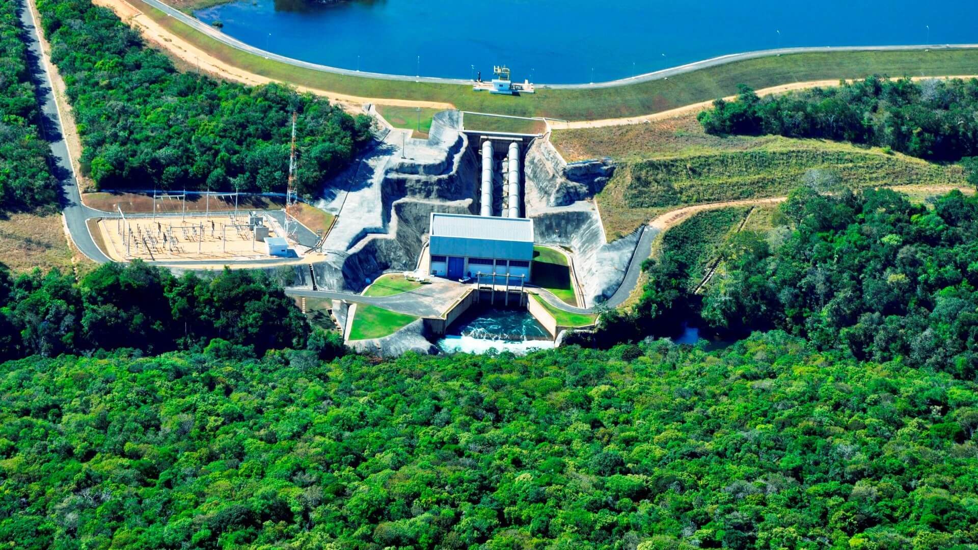 small hydroelectric plant set amidst lush green forest