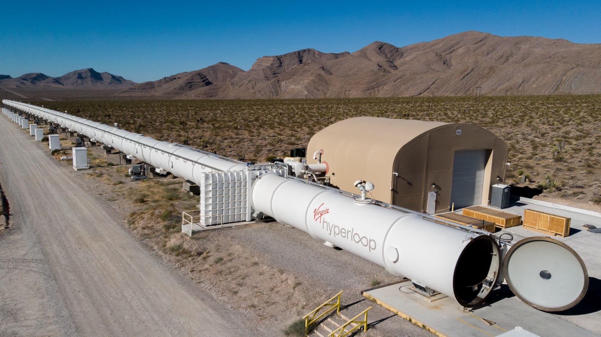  Hyperloop test site tube set against desert background and blue sky