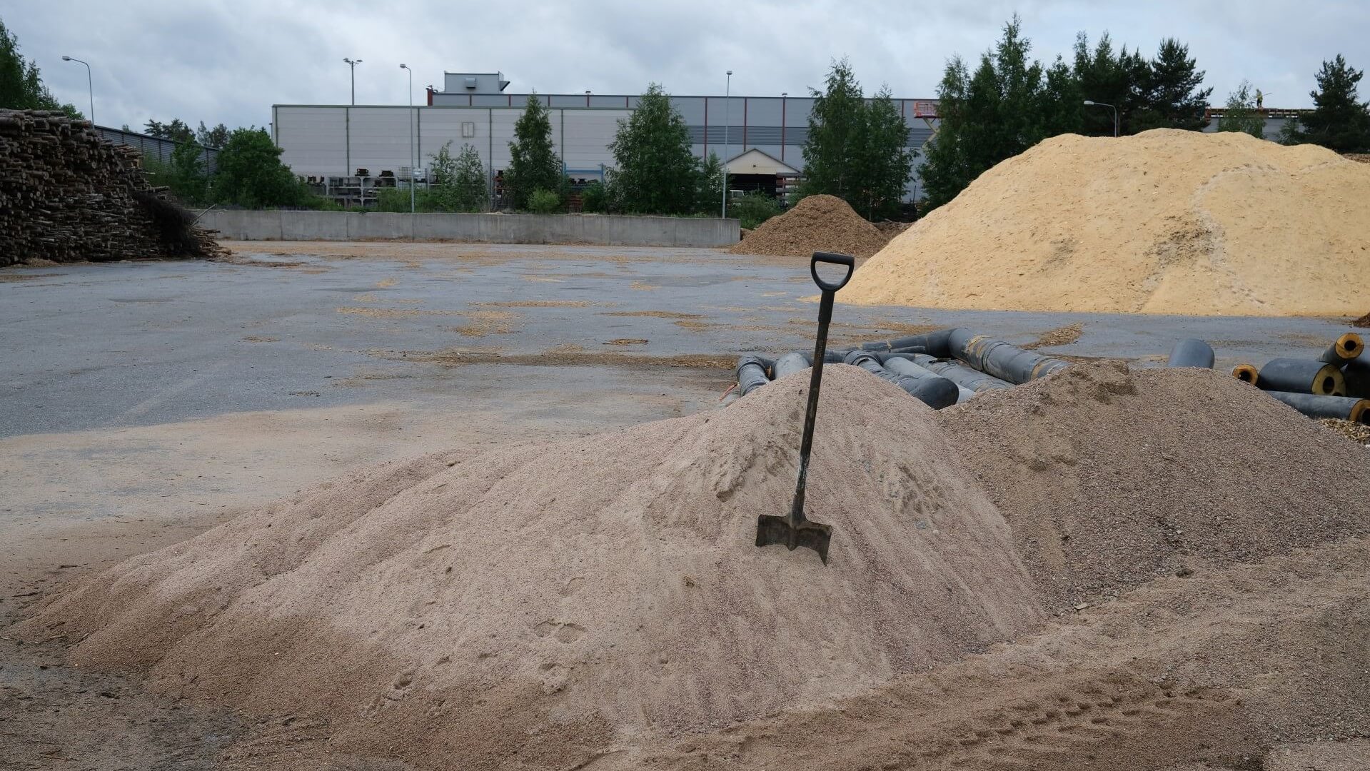 pile of sand and spade
