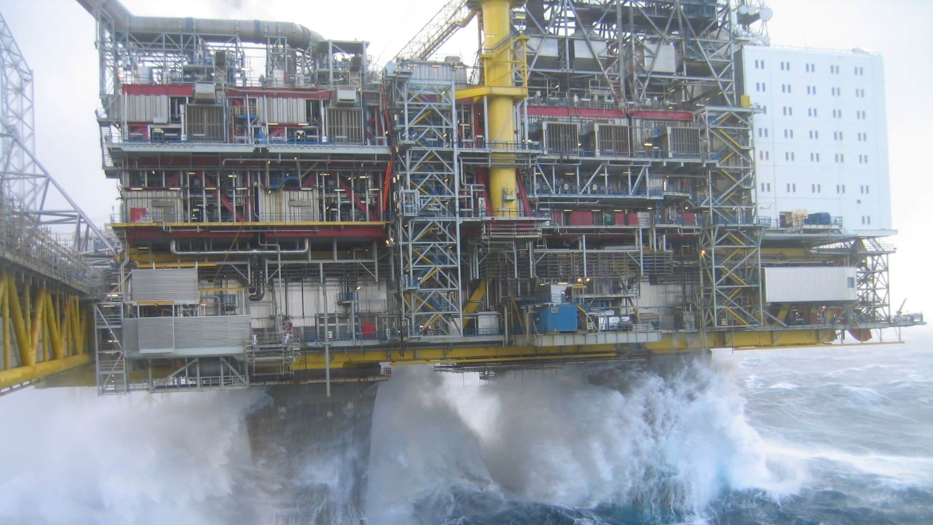 close up photo of oil and gas platform in stormy sea